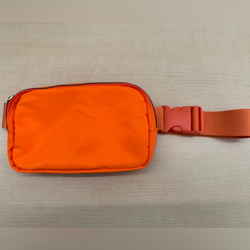 Fanny Pack Orange Crossbody Bag for Unisex.
Length: 8 inches 
Height: 5 inches